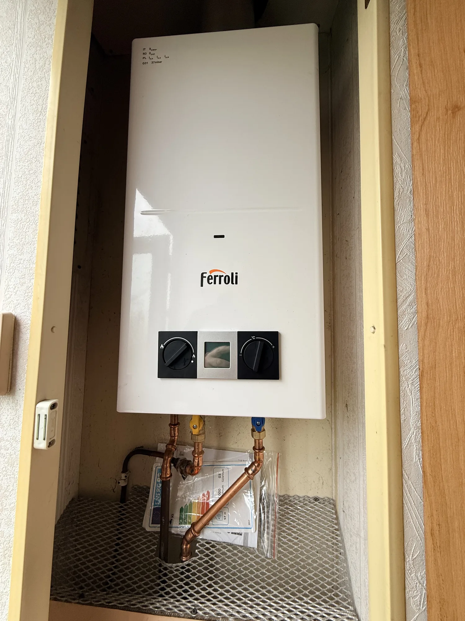 Ferroli LPG combi boiler with copper pipework and energy label